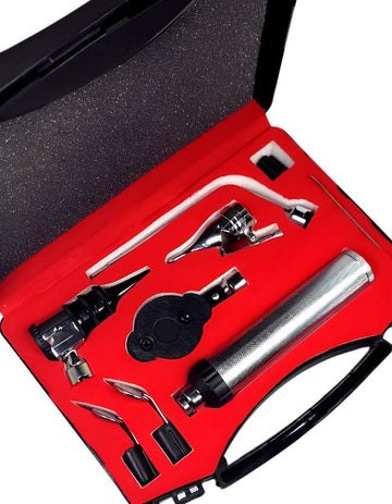 Set of medical instruments in a red case on a white background